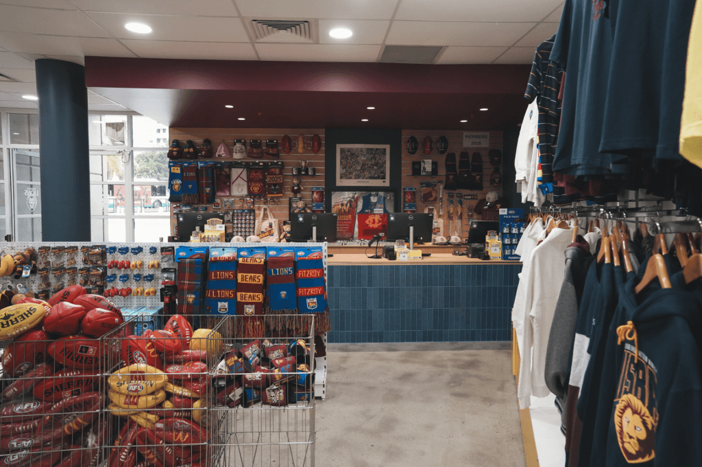 Suspended ceiling and bulkhead above the Brisbane Lions merchandise store counter at The Gabba