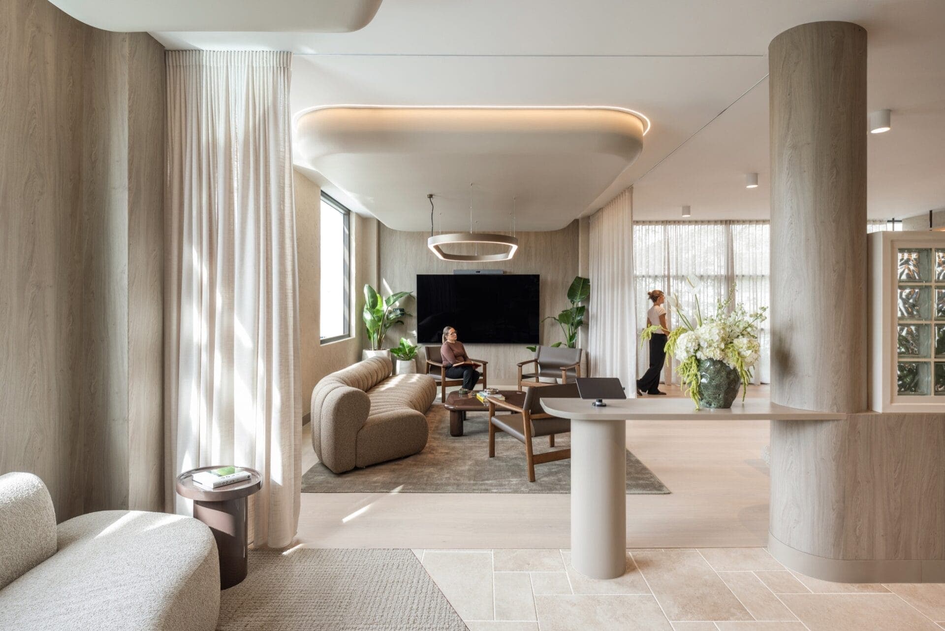 Sculpted ceiling and curved interior walls at the McCormack Brisbane office